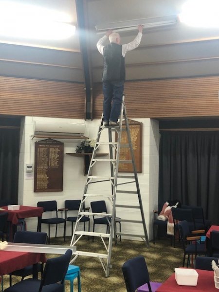 Brett Glass up a ladder 2020.jpg